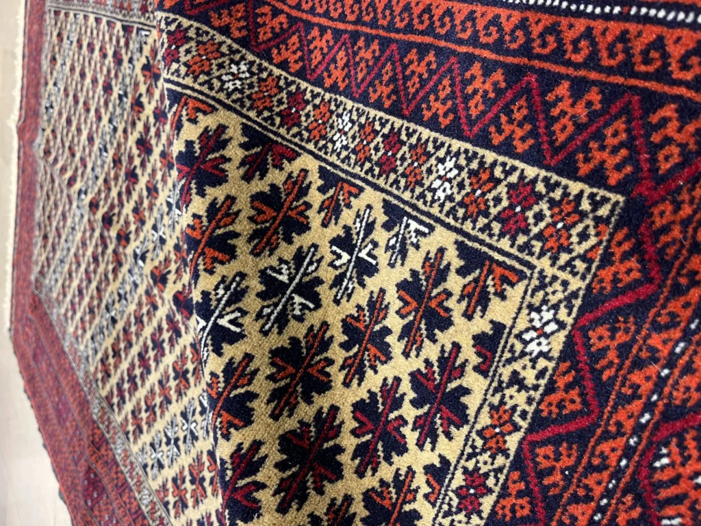 فرش دستباف 1.5 متری بلوچ چله پشم با ابعاد ۱۷۵x۱۱۲