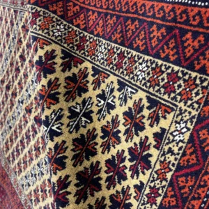 فرش دستباف 1.5 متری بلوچ چله پشم با ابعاد ۱۷۵x۱۱۲